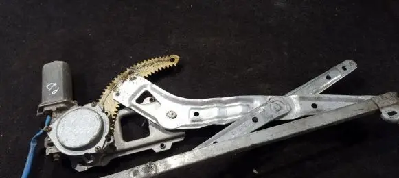 Subaru Impreza I Sliding door window regulator with motor