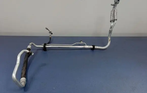 Hyundai Tucson IV NX4 Air conditioning (A/C) pipe/hose 97775CZ000