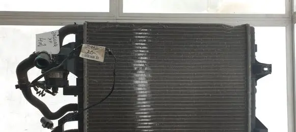 Jaguar XF Intercooler radiator 9W838K230AB