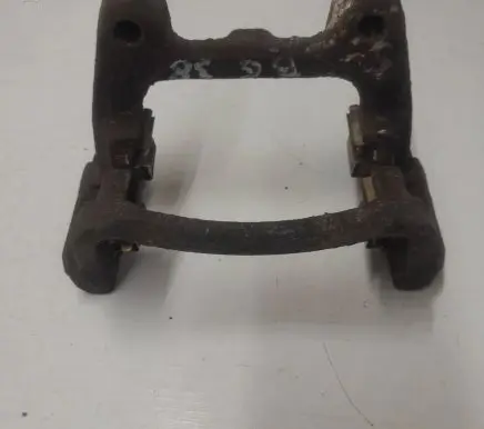 Volkswagen PASSAT B6 Brake caliper pad carrier rear 