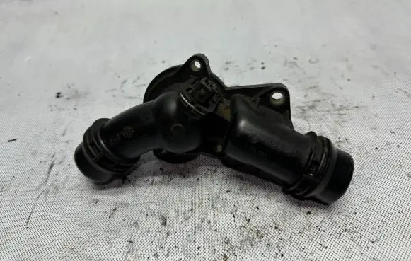 Thermostat/thermostat housing