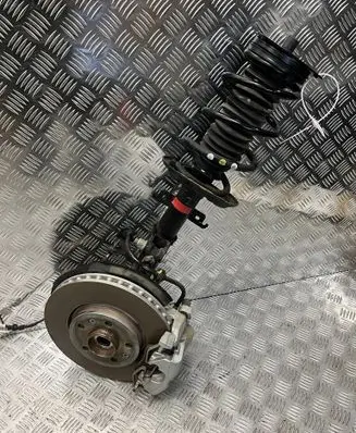 Renault Kangoo III Front shock absorber with coil spring
