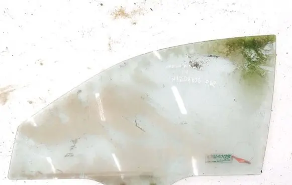 Mazda 626 Front door window glass four-door 