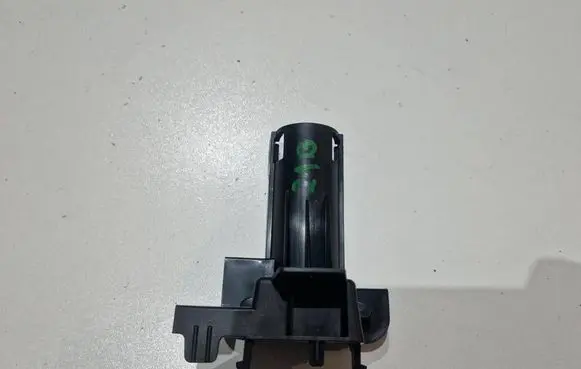 Headlight washer nozzle holder