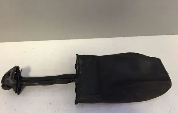 Front door check strap stopper