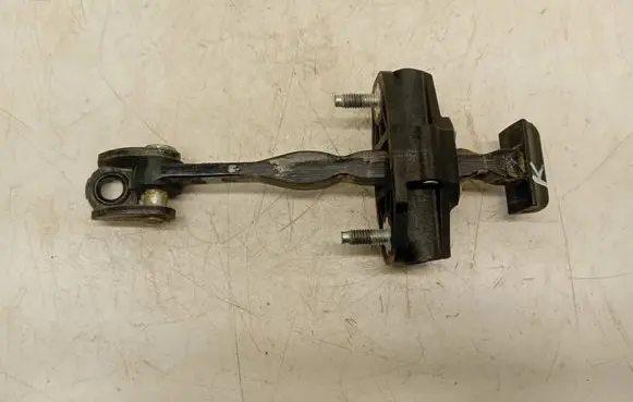 Ford Fiesta Front door check strap stopper C8P5D CA6AA23500