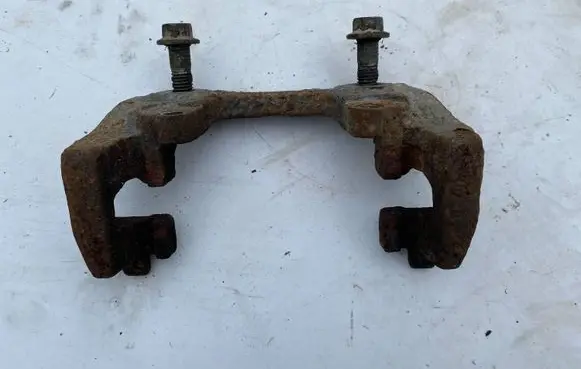 Volvo V70 Front Brake Caliper Pad/Carrier 