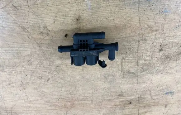 Coolant heater control valve