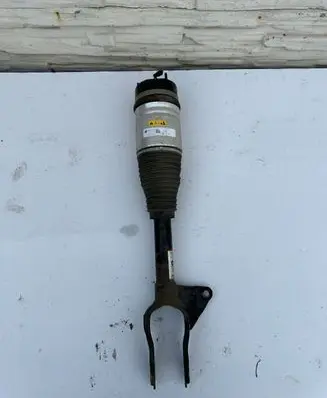 Jeep Grand Cherokee Front shock absorber with coil spring