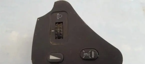 Headlight level height control switch