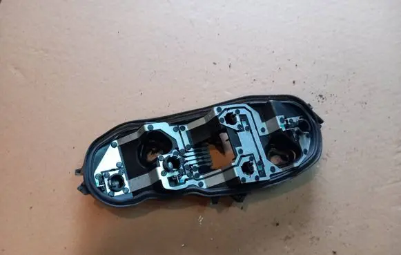 Opel Corsa D Tail light bulb cover holder 89037853A