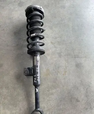 Front shock absorber with coil spring
