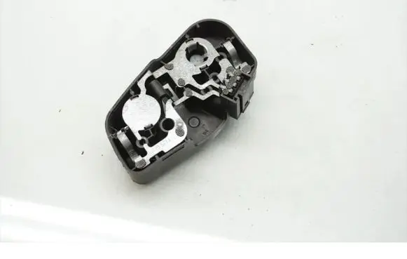 Tail light bulb cover holder