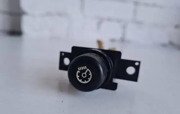 Panel lighting control switch