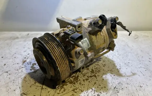 KIA Sportage Air conditioning (A/C) compressor (pump) 97701D7550