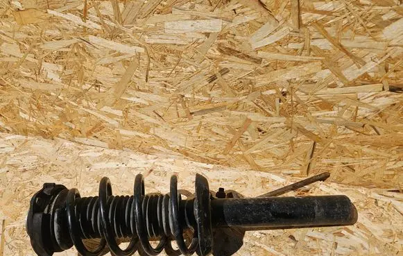 Volkswagen Golf Plus Front shock absorber with coil spring