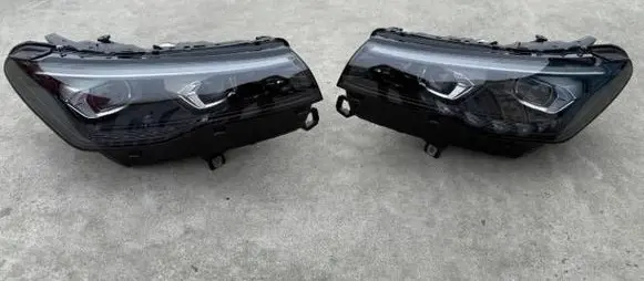 Volkswagen Tiguan Headlights/headlamps set 0301132235 571941059E 571941060E