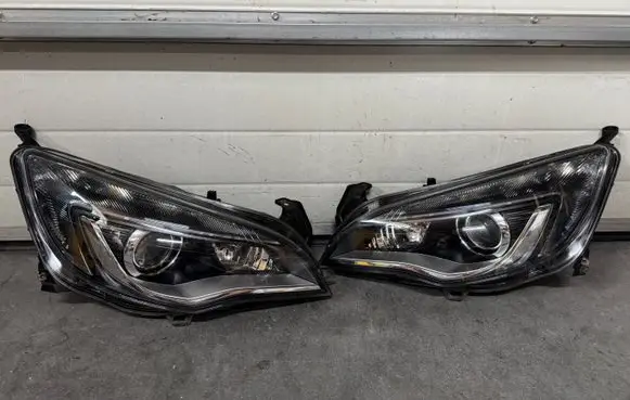 Opel Astra J Headlights/headlamps set 13374517 13374518