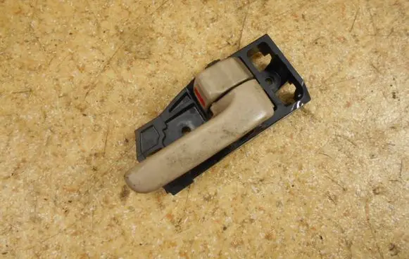Toyota Land Cruiser (J100) Front door interior handle 