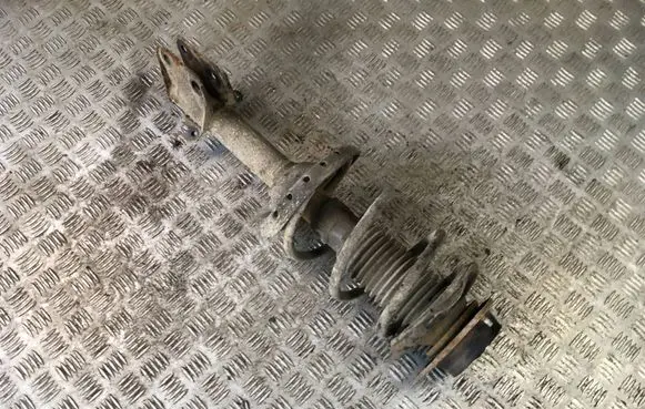Subaru Outback Front shock absorber with coil spring