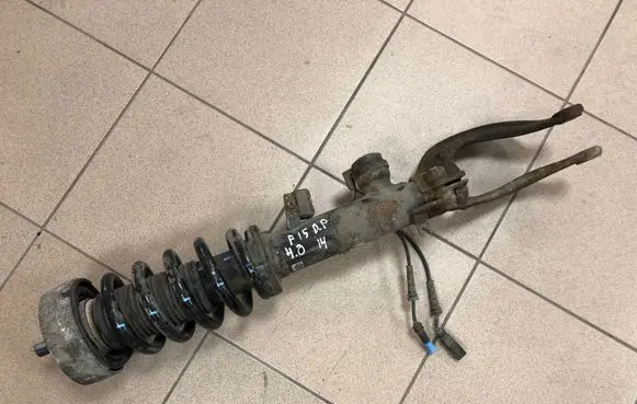 Front shock absorber with coil spring