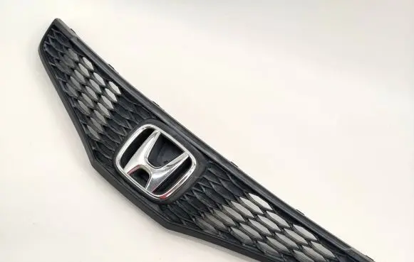 Honda Jazz Front bumper upper radiator grill 71121TF000