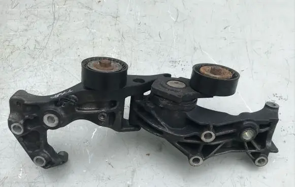 Opel Astra J Alternator belt tensioner 55565570