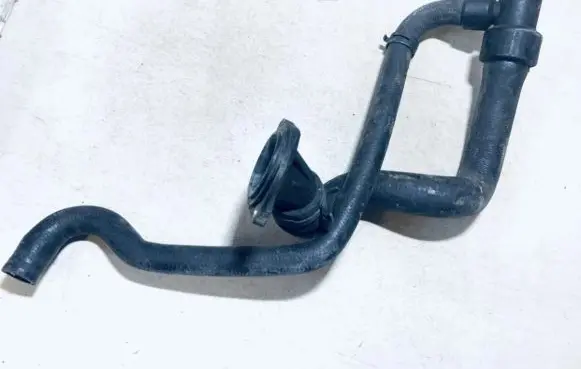 Volkswagen PASSAT B5 Engine coolant pipe/hose 8D0121055F