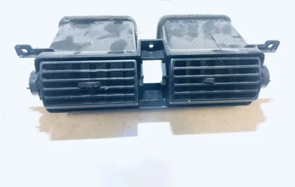 Chevrolet Tacuma Dash center air vent grill