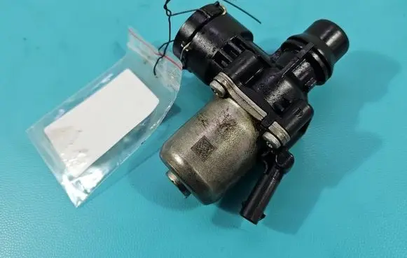 Coolant heater control valve