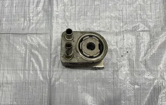 Jeep Cherokee Oil filter mounting bracket 05047370AC