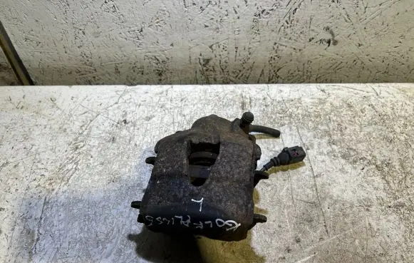 Volkswagen Golf V Front brake caliper