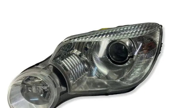 Skoda Yeti (5L) Headlight/headlamp 5L1941015B 03012482810