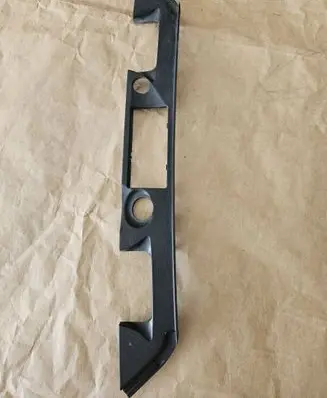 Trunk door license plate light bar