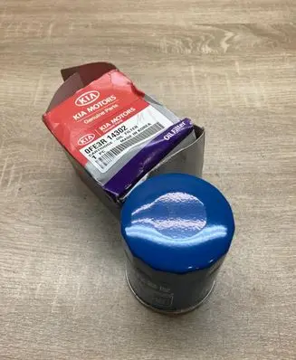 KIA Sportage Oil filter cover 0FE3R14302