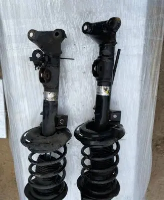 Mercedes-Benz E A207 Front shock absorber with coil spring A2073204138