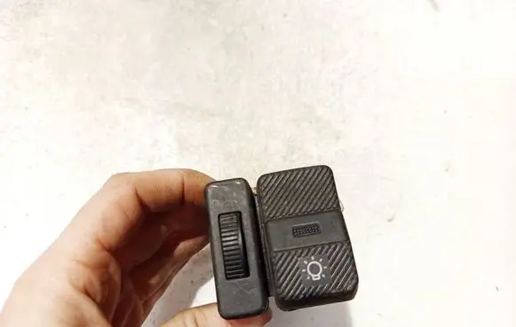 Headlight level height control switch
