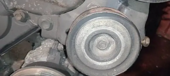 Generator/alternator belt tensioner
