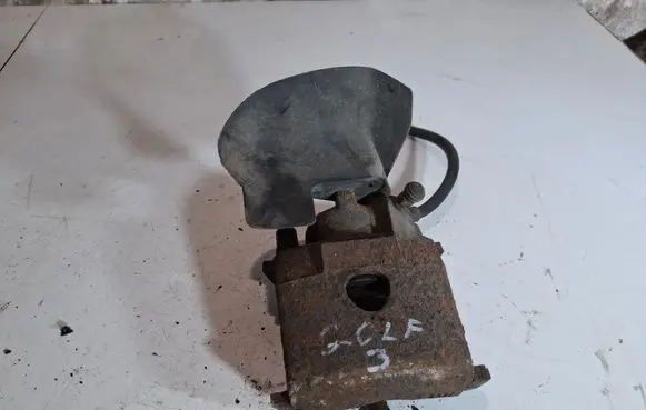 Volkswagen Golf III Front brake caliper
