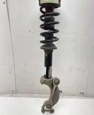 Front shock absorber with coil spring