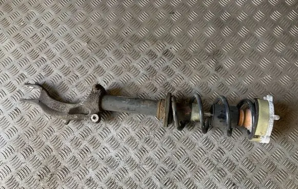 Front shock absorber with coil spring