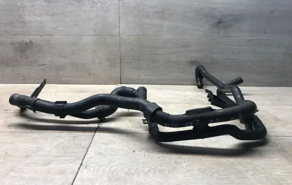 Volkswagen PASSAT B7 Engine coolant pipe/hose 1K0133687B