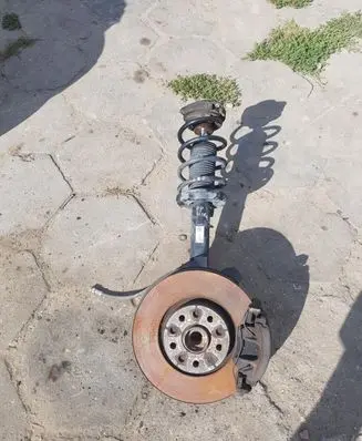 Front shock absorber with coil spring