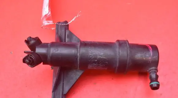 Windshield washer spray nozzle