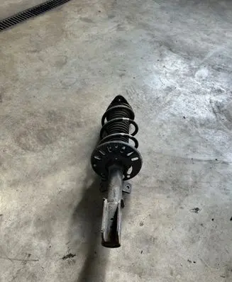 Opel Combo E Front shock absorber with coil spring 9833306080 03031000739