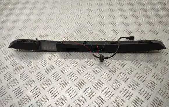 Volkswagen Caddy Trunk door license plate light bar 2K0827574F