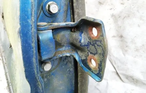 Mazda Demio Rear door lower hinge
