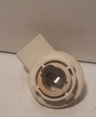 Tail light bulb cover holder