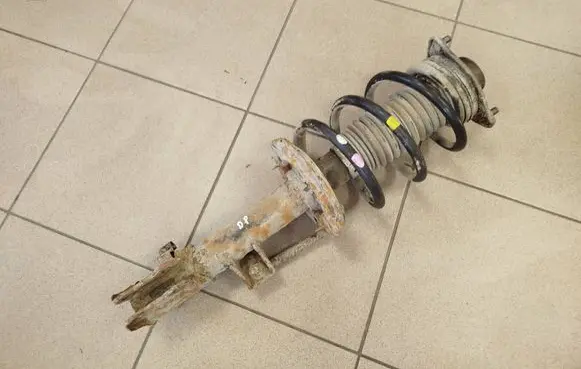 KIA Sportage Front shock absorber with coil spring 