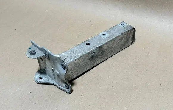 Radiator support slam panel bracket